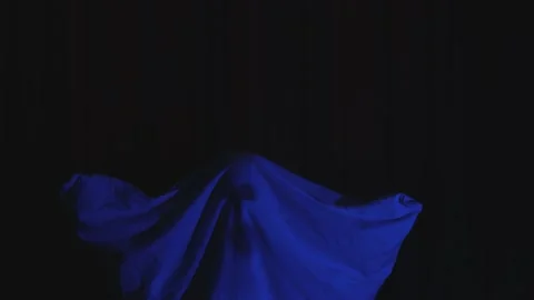 Ghost spirit slowly floating down disappearing in dark blue background at night Stock Footage 164001220
