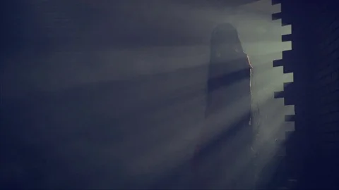Ghost walks out of Wall with Light FX Stock Footage 82596052