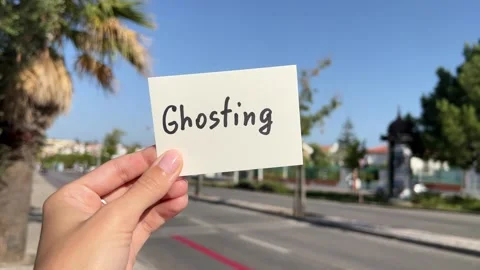 Ghosting - hand with psychology note outdoors, relationship issue concept Stock Footage 339300964