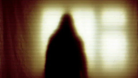 A ghostly female figure moving inside a disturbed television screen Stock Footage 77965074