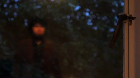Ghostly figure in the window Stock Footage 96476328
