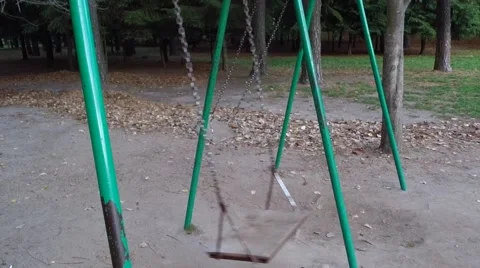 Ghostly swing in the park Stock Footage 55875047