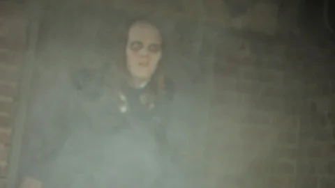 Ghostly Vampire Man in a Dark, Haunted House Stock Footage 100476999