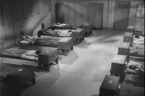 G.I removes rope hidden under his blanket with intention to commit suicide-1968 库存影片 118317178