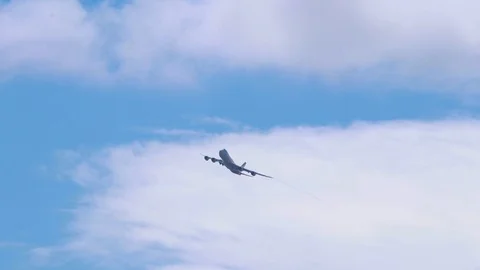 Giant 4-engine plane in the air descending. Stock Footage 99438735