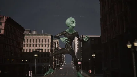 The giant alien dances like he's playing the guitar Stock Footage 286806046