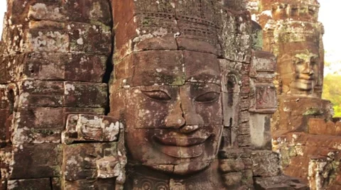 Giant, ancient, sculpted stone faces at bayon temple, cambodia Video stock 44079189