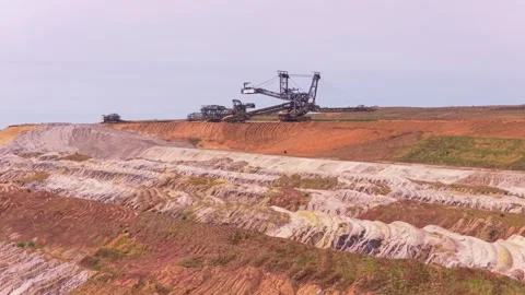 Giant bucket wheel excavator operating in open pit coal mine Stock Footage 342813745