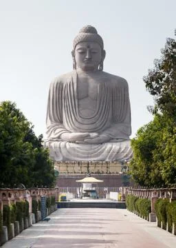The Giant Buddha Statue and tiny chipmunk. Stock Photos