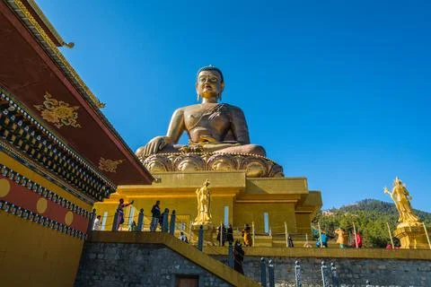 Giant Buddha statue from below Stock Photos
