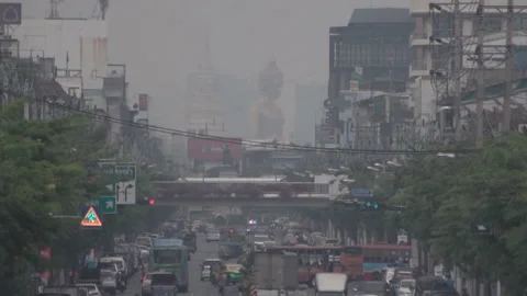 Giant Buddha Statue is obscured by a thick blanket of dust and pollution . Stock Footage 236793128