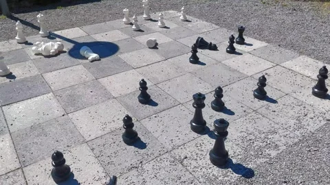 Giant Chess Game on Stone Pavement in Swiss Town Square 4K Stock Footage 340657714