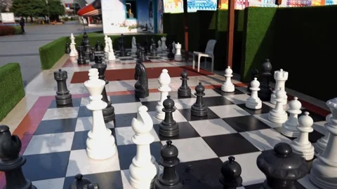 A giant chess set next to a labyrinth in Miniaturk Park in Istanbul Stock Footage 293842735