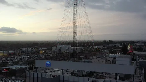 Giant Christmas tree made of lights on top of building Stock Footage 121664594