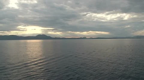 Giant cloud formation dominates an evening seascape Stock Footage 11194551