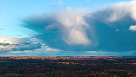 Giant cloud layer over rural countryside forest in Latvia time lapse Video stock 321145799