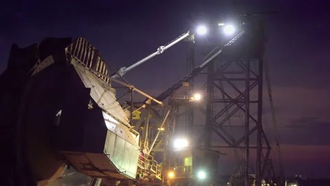Giant Coal Mining Paddle Wheel in the Night Stock Footage 137278061