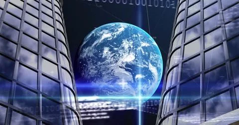 Giant Earth, glowing in digital code, hovering between two skyscrapers 库存照片