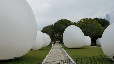 Giant Easter egg art installation in Tamar park Hong Kong Stock Footage 271191280