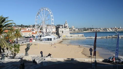 A giant ferris wheel has been setup at Cascais Beach ahead of the xmas season Stock Footage 99462913