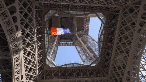 Giant French flag under the Eiffel Tower in Paris, France Stock Footage 284091093