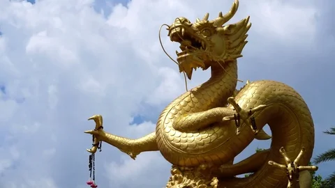 Giant golden Chinese dragon in Phuket Town, Thailand Stock Footage