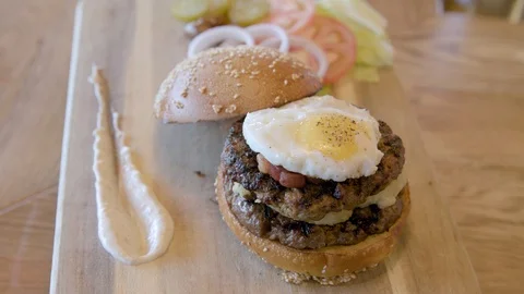 Giant hamburger with egg and Extras Video stock 92018786