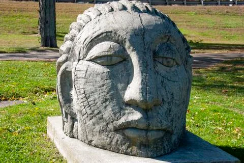 Giant head statue at the park Stock Photos