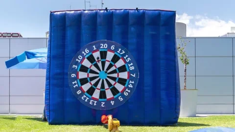 Giant inflatable foot dart board in outside/outdoor. Stock Footage 137828720