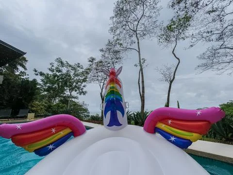 Giant Inflatable Unicorn Pool Float Floatie Ride Stock Photos