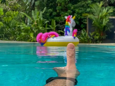 Giant Inflatable Unicorn Pool Float Floatie Ride Stock Photos