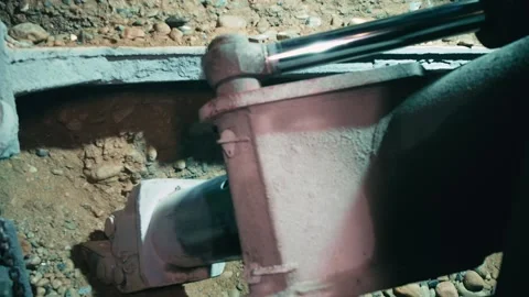 Giant Legacy Excavator Tearing Into Solid Rock Face in Metro Construction Stockbeeldmateriaal 314784675