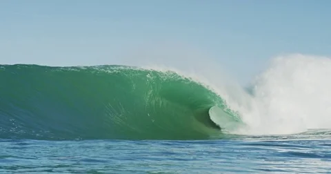 Giant Ocean Wave Breaking. Slow Motion 4K. Perfect empty beautiful wave in blue  Stock Footage 81482632