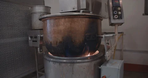 Giant Pot Of Candy Boiling On Flame 스톡 동영상 105344566