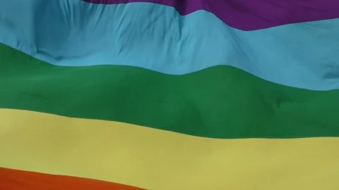 Giant rainbowflag waving slowmotion Stock Footage 114003040