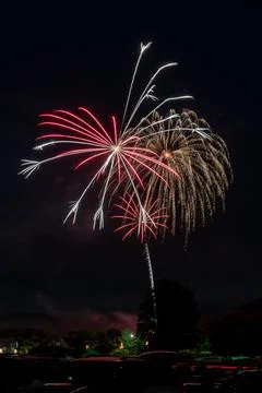 Giant Rocket Fireworks Exploding at Night Stock Photos