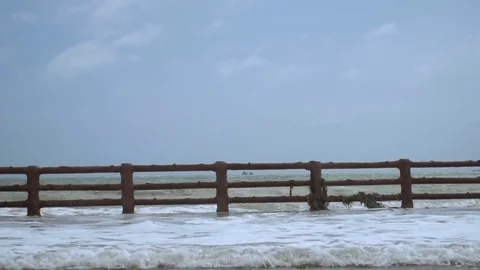 Giant Sea Waves Fall on Waterfront. Slow Motion.2mov Stock Footage 83169468