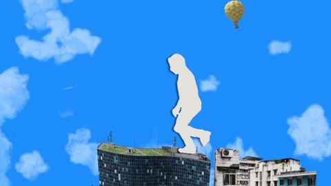 Giant silhouette walking across rooftops and towers Stock Footage 346778636