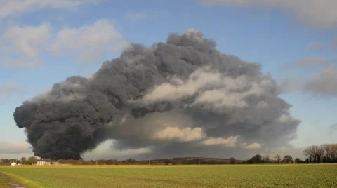 Giant smoke cloud from fire at tyre recycling plant, Sherburn,, United Kingdom Stock Footage 48134669