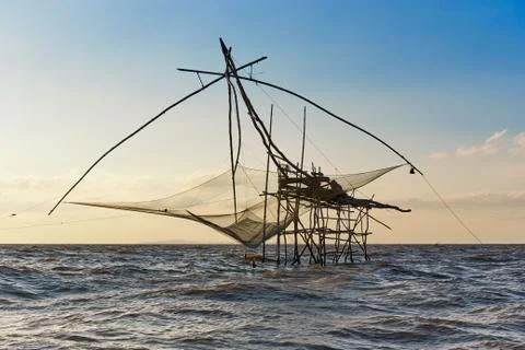 Giant square dipnets for trapping fish on blue sky background Stock Photos