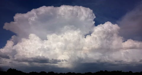 Giant Storm Cloud Growing Time Lapse (2160p 29.97) Stock Footage 166419759