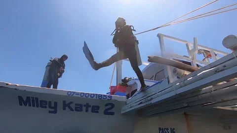 Giant Stride Entry on Dive Boat - Scuba Diving 動画素材 108521022