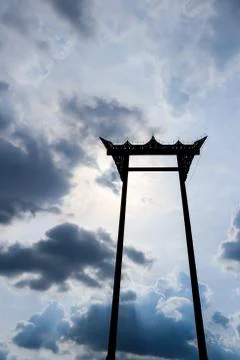 Giant swing in cloudy sky Stock Photos