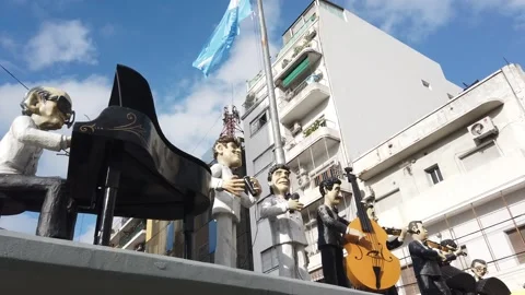 Giant Tango Orchestra Figures with Piano Bandoneon and Bass at Almagro Buenos Stock Footage 342296576
