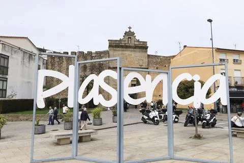 Giant three-dimensional letters forming the word Plasencia next to The Puer.. Stock Photos