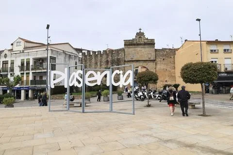 Giant three-dimensional letters forming the word Plasencia next to The Puer.. Stock Photos