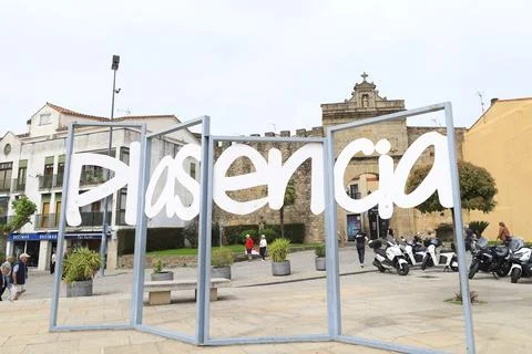 Giant three-dimensional letters forming the word Plasencia next to The Puer.. Stock Photos