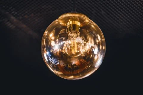 Giant vintage style light bulb Stock Photos