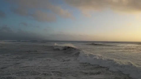 Giant Waves in Slow Motion with Sunset Stock Footage 229414659