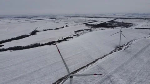 Giant wind turbine, windmill; Close up, breathtaking aerial view in winter Stock Footage 151955719
